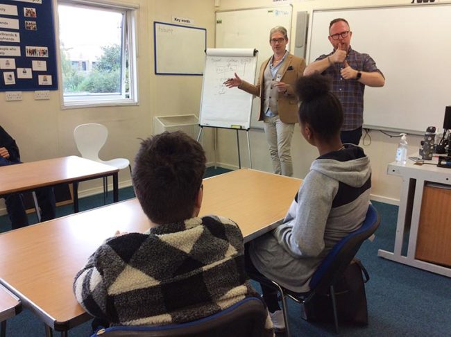 Teachers with students